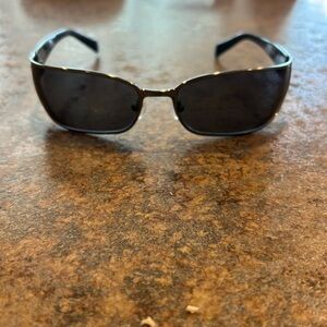 Mens Prada SPR53F black sunglasses.